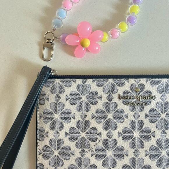 kate spade Handbags - KATE SPADE NWOT Leather Lucy Spade Flower Wristlet, Beaded Bag Charm INCLUDED!